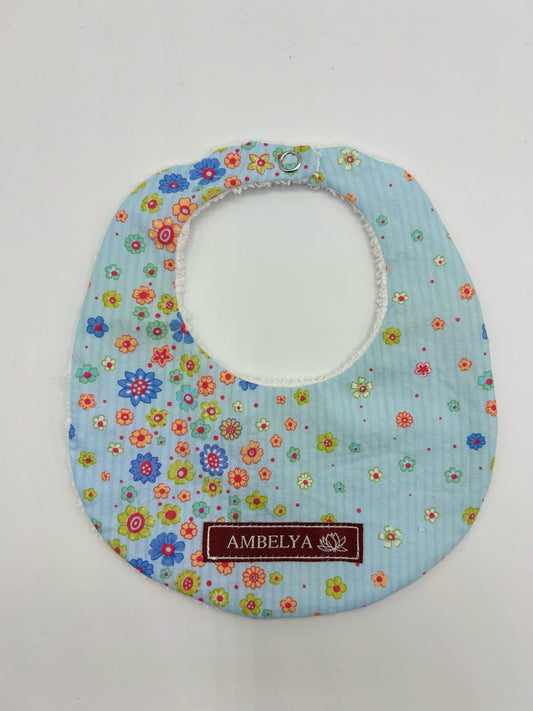 photo d'un bavoir bleu clair Ambelya pour enfant 